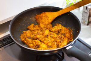 Cooking marinated chicken for Chicken Pizza Recipe