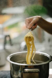 spaghetti boiling in salted water