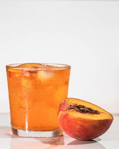 homemade peach juice recipe served with ice